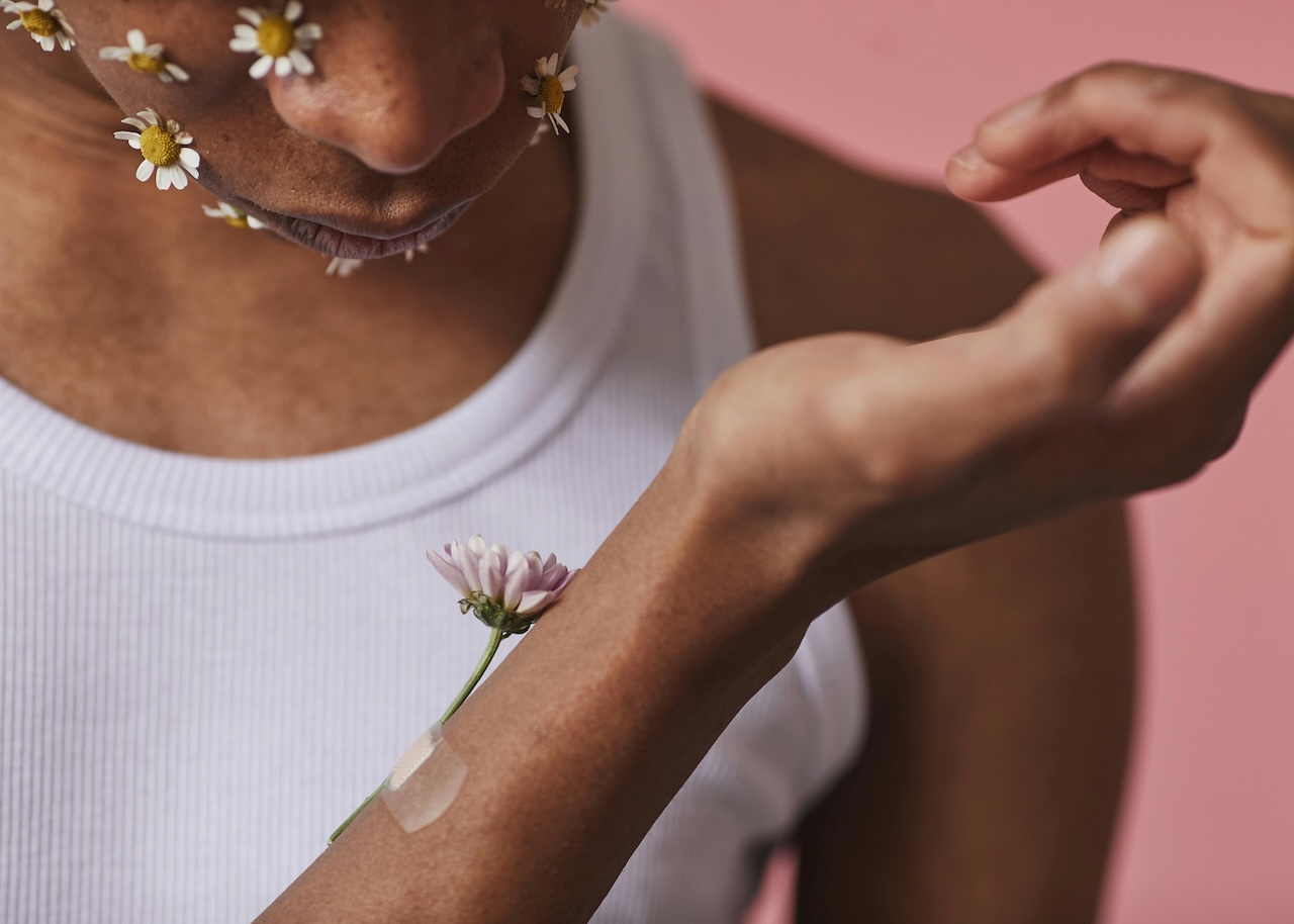 A person covered in flowers