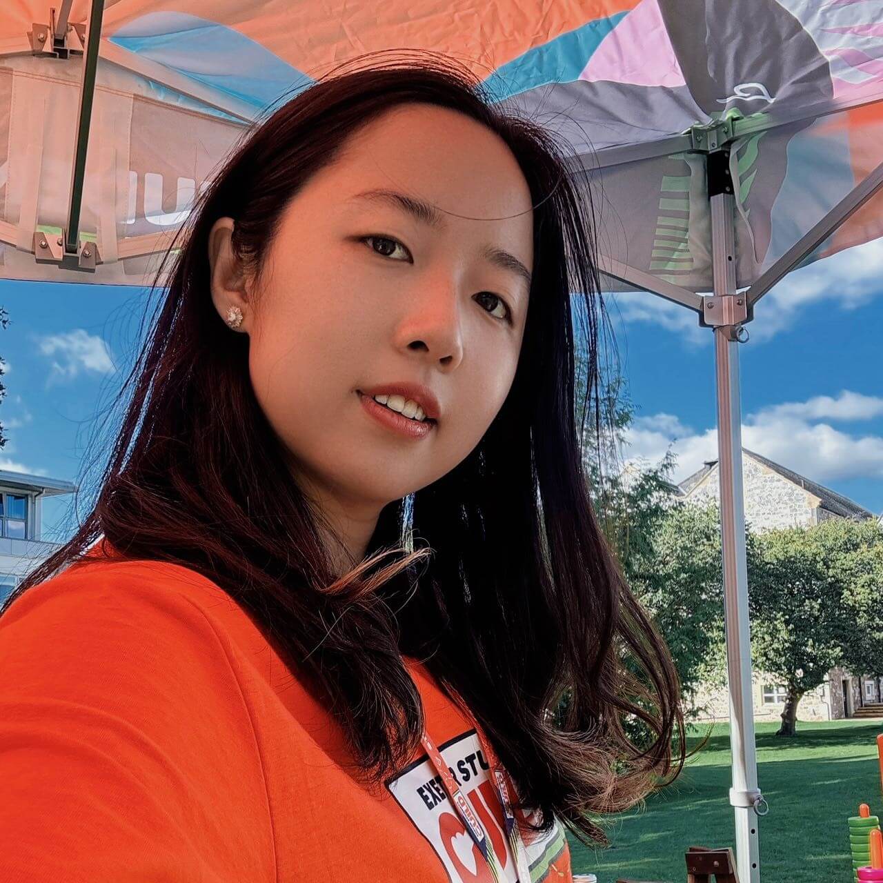 Student staff member outside