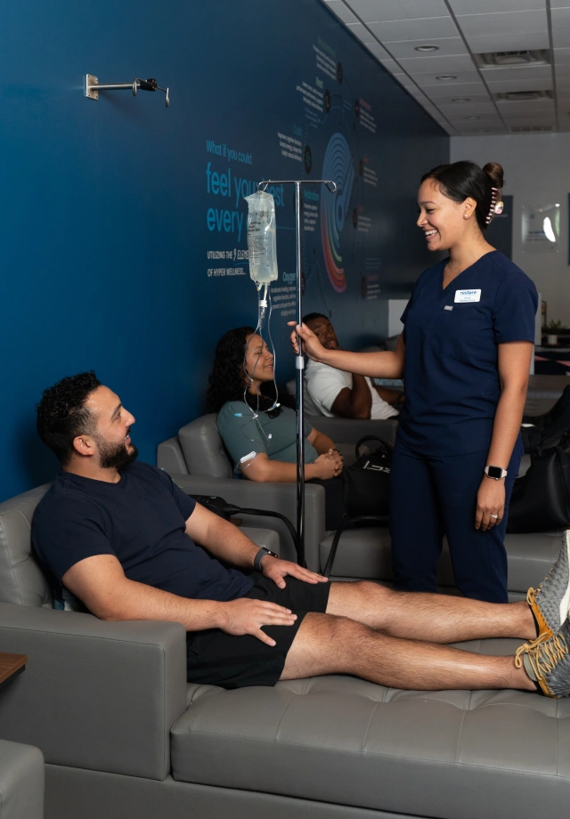 A Restore nurse administers a NAD+ IV Drip