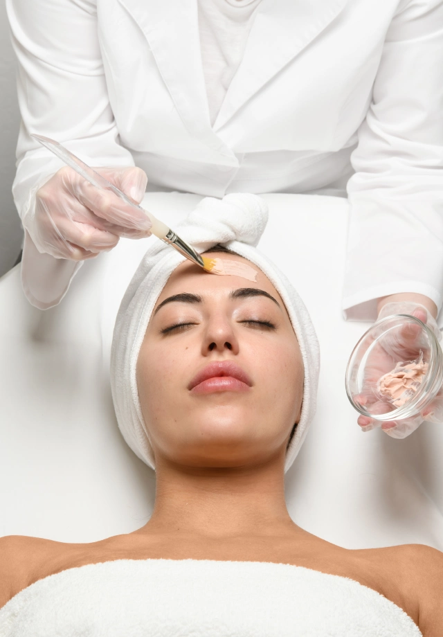 woman receiving a Marini Vitamin C facial at Restore Hyper Wellness