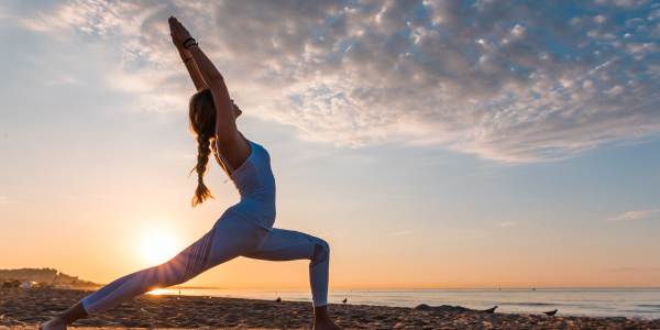 Woman meditates alone in nature for mental health