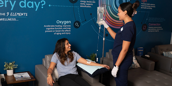 person getting an NR IV drip at Restore Hyper Wellness