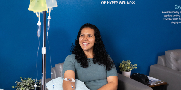 Woman gets IV Therapy at Restore Hyper Wellness for beauty, immunity and more