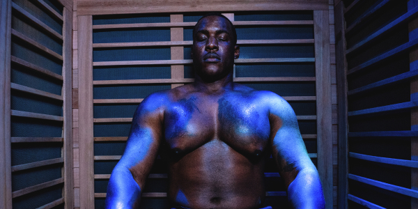 Man tries Infrared Sauna for winter recovery at Restore Hyper Wellness
