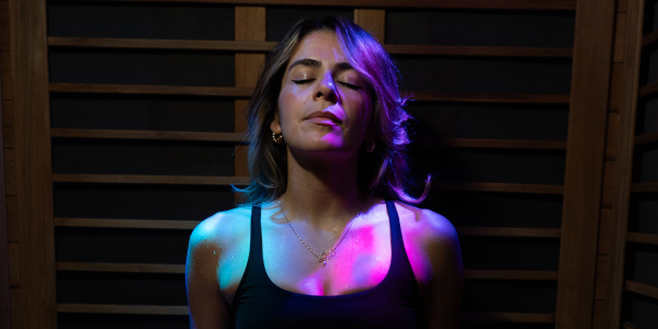 woman using Infared Sauna at Restore