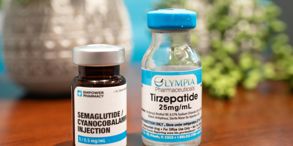 vials of tirzepatide and semaglutide sitting on a shelf