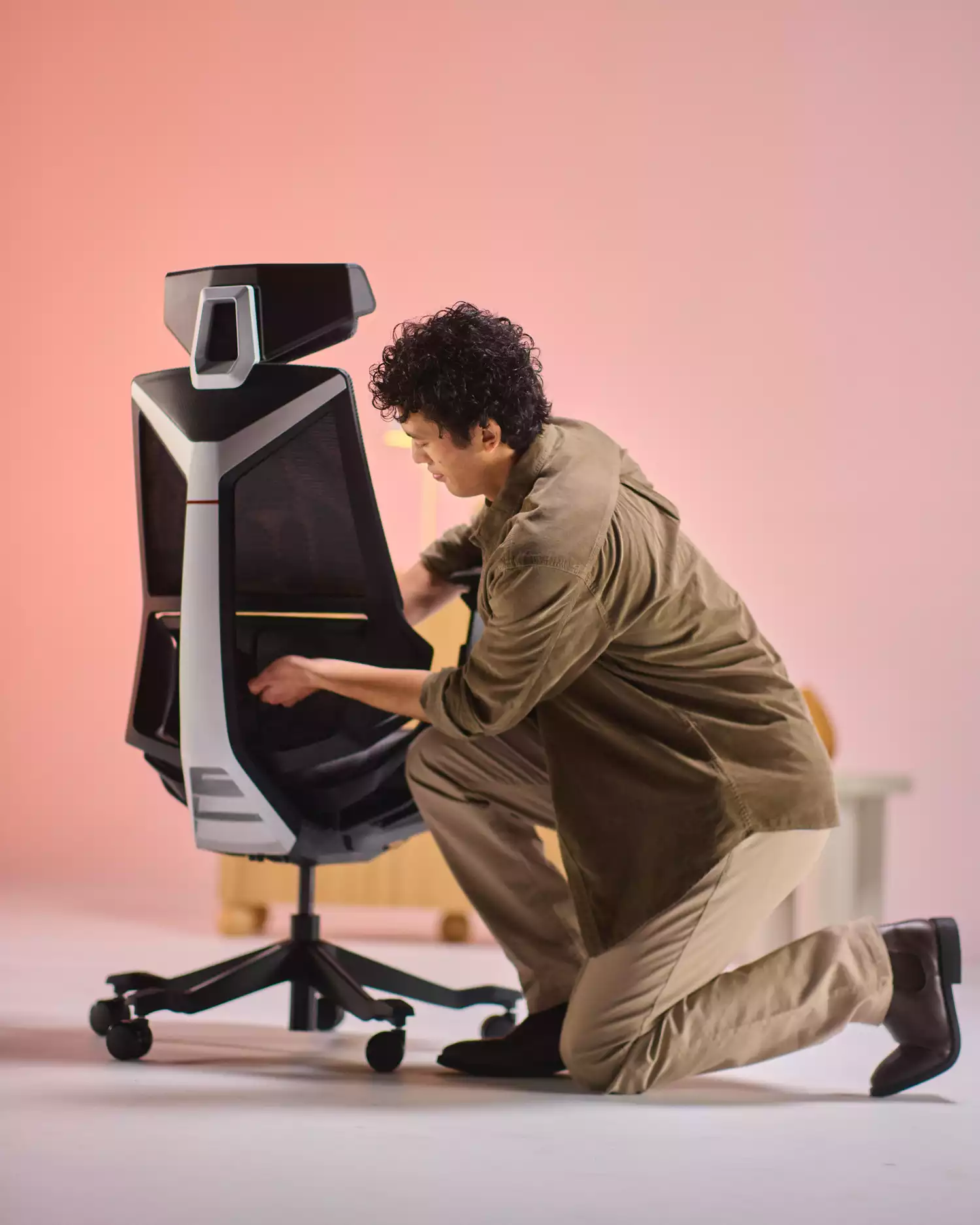 Pago Valkor black gaming chair with ergonomic design, adjustable headrest, lumbar support, and sleek modern styling.