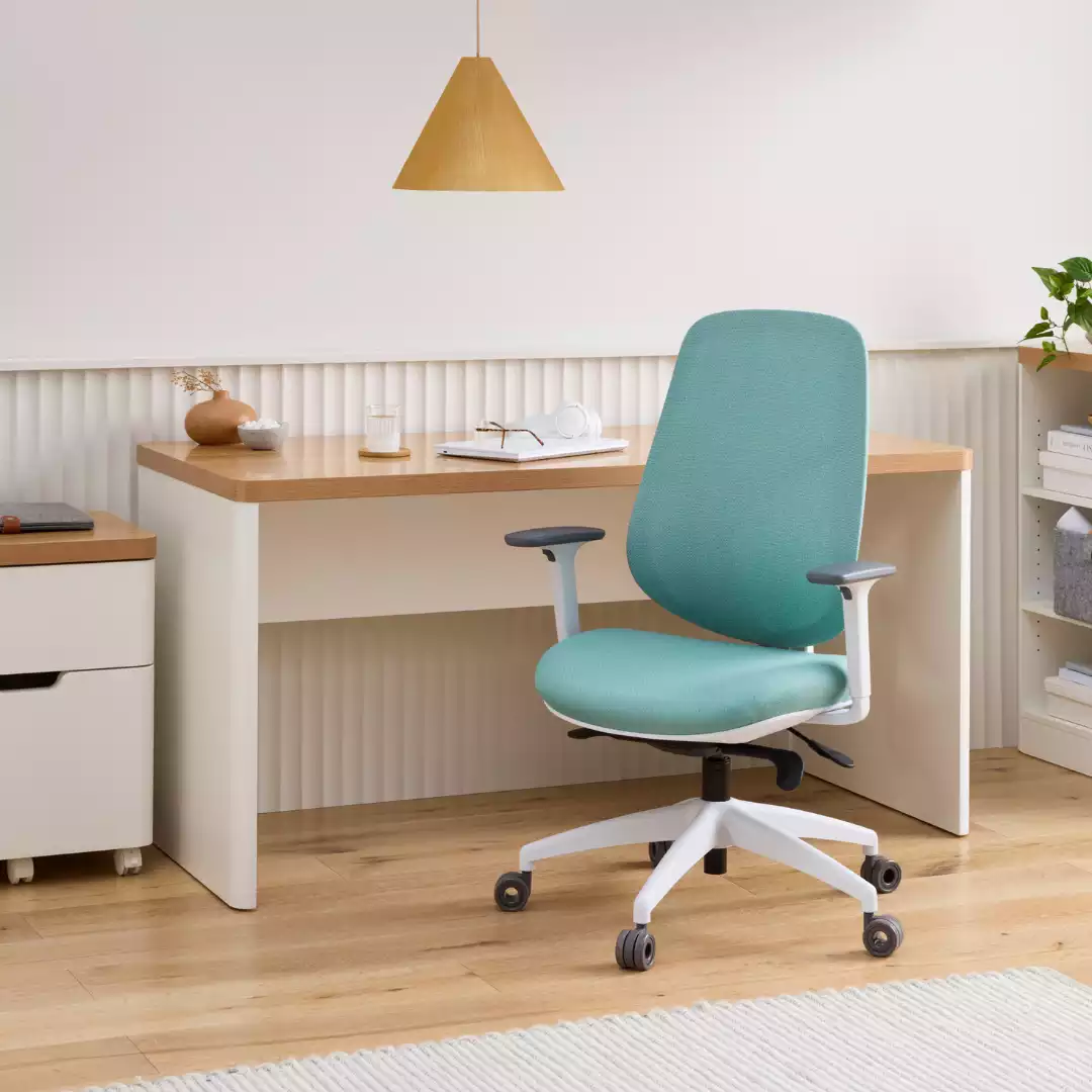 In situ image of Pago Airform Ergonomic Office Chair, Forest colour with PostureSure Synchro mechanism for self-adjusting weight balance.