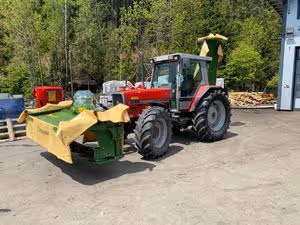 Übergabe einer Krone Mähkombination
