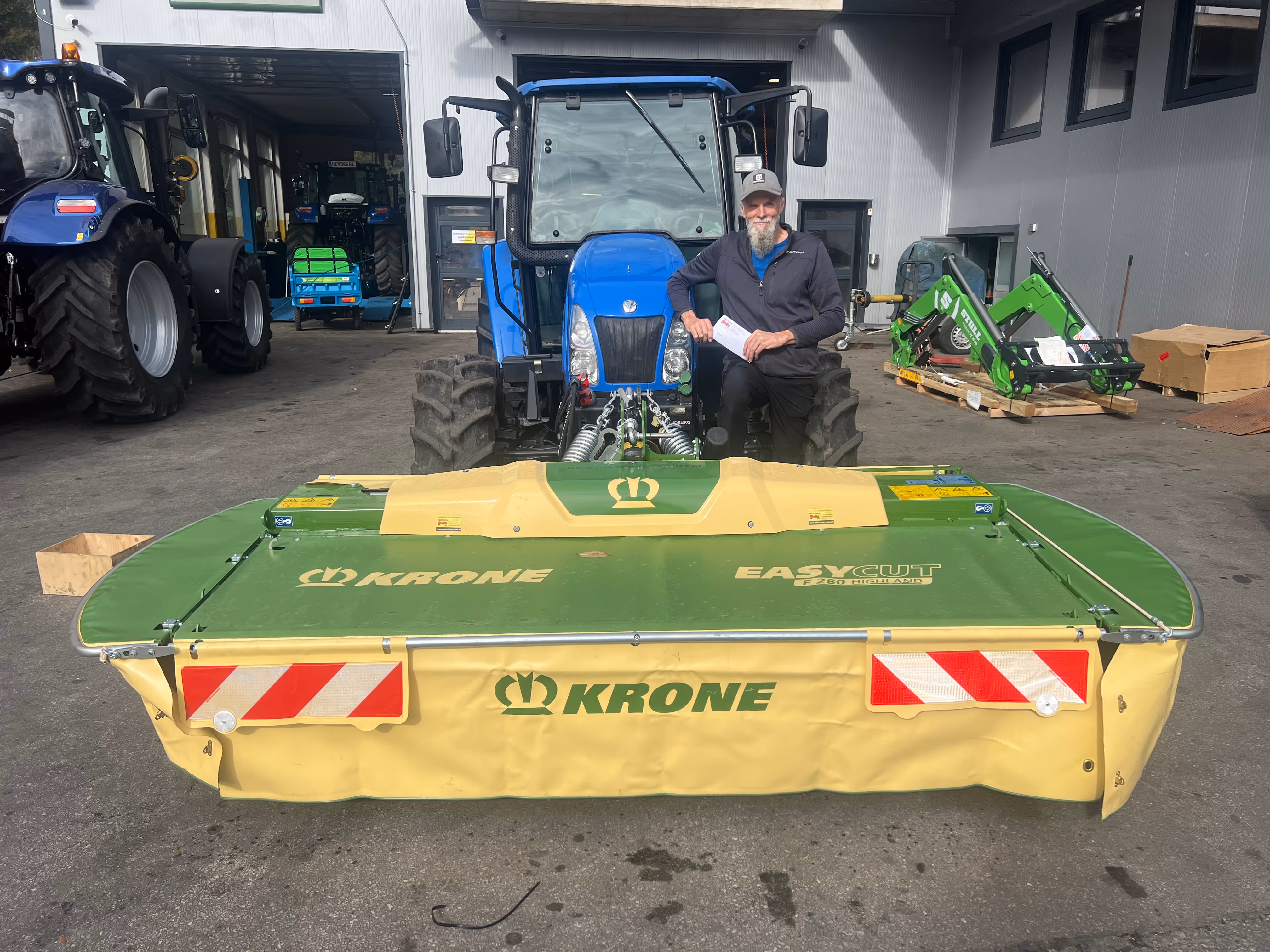 KRONE Scheibenmähwerk-Übergabe