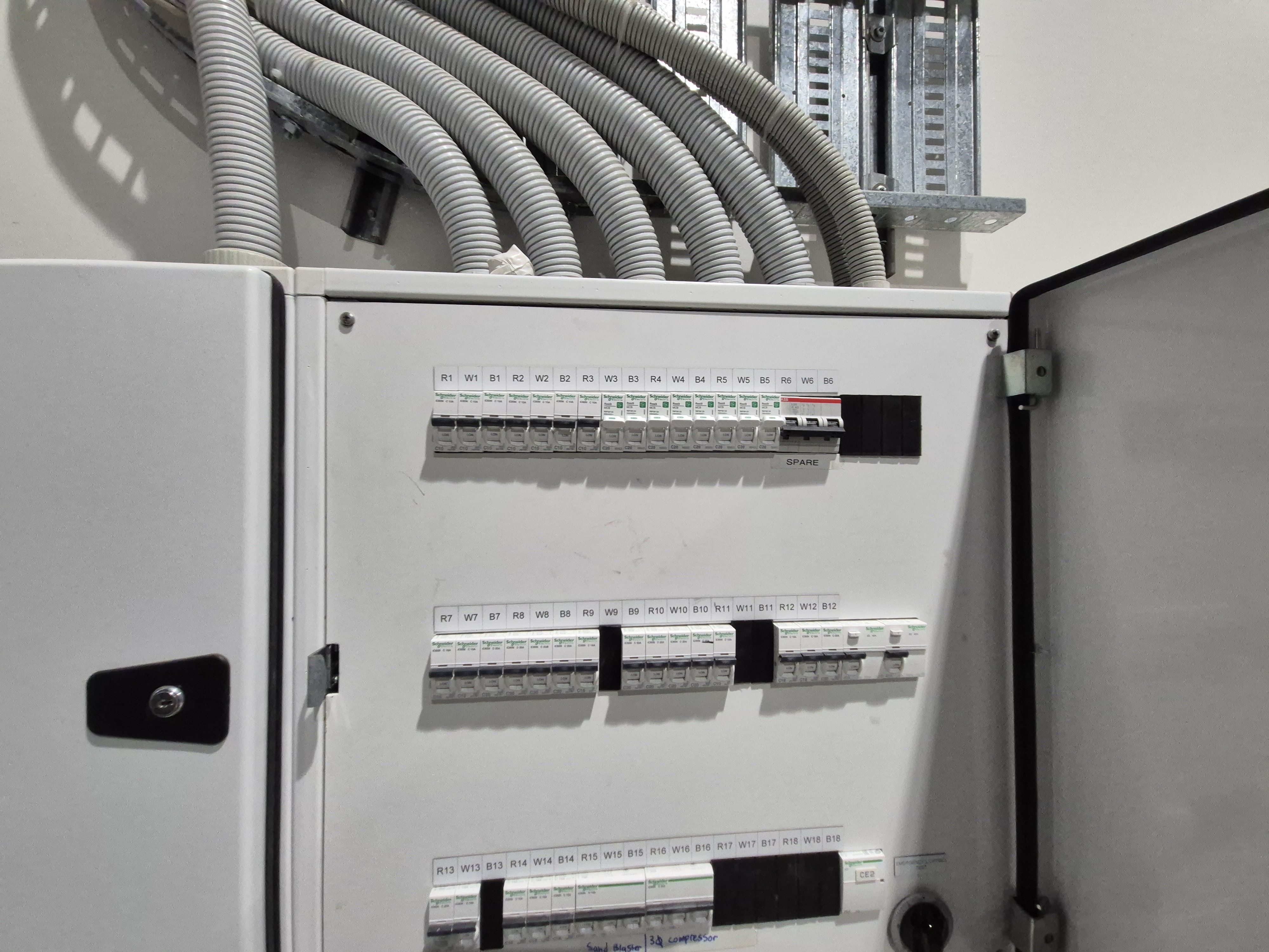 Industrial lighting and electrical project photo.