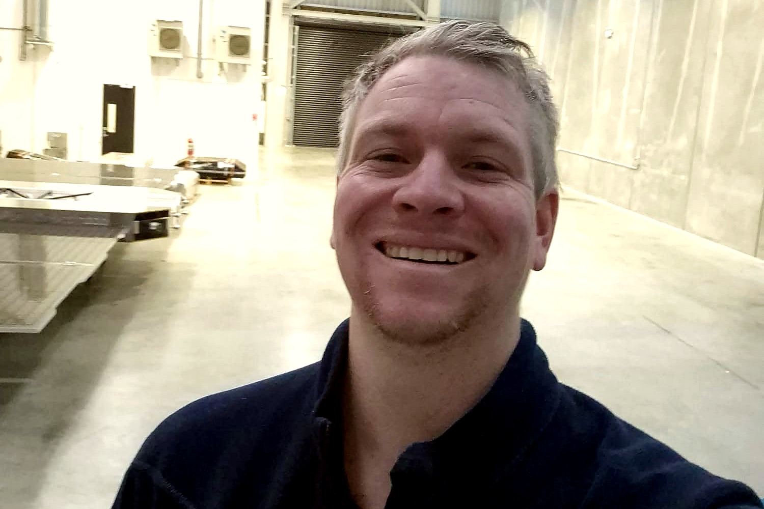 Nick from ENVY Electrical on a commercial electrical project site in Auckland.