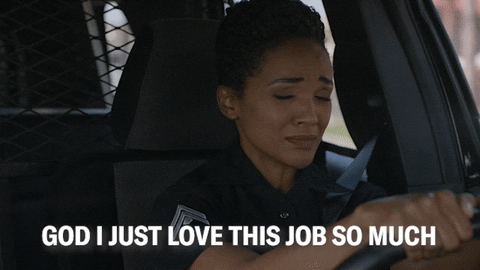A female police officer saying, "God I just love this job so much."