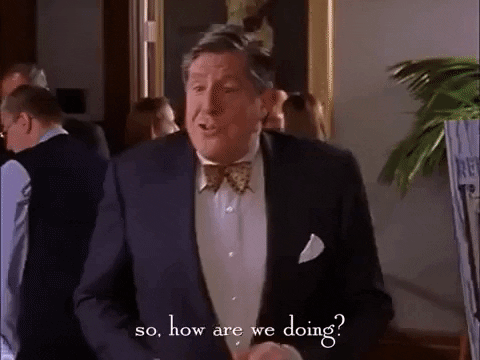 A man approaches, asking, "So, how are we doing?"