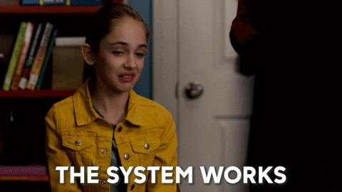 A girl saying, "The system works."