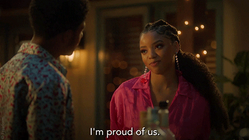A woman saying, "I'm proud of us."