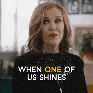 An older white woman saying, "When one of us shines, all of us shine."