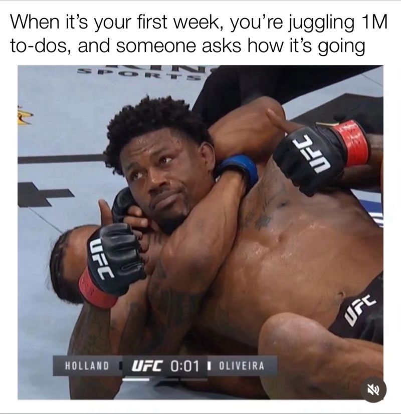 When it's your first week at work, man in a headlock.