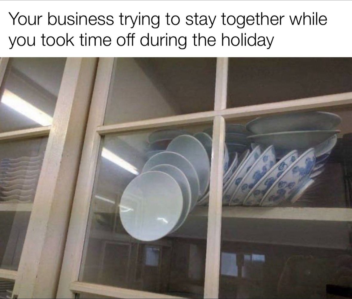 Falling bowls held up by closed cabinet door.