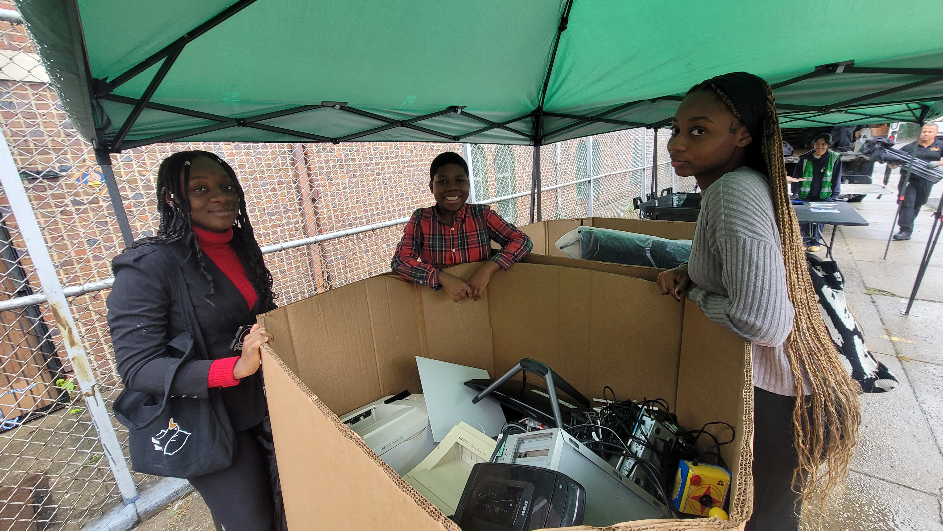 Parishioners collecting electronics at an e-waste event