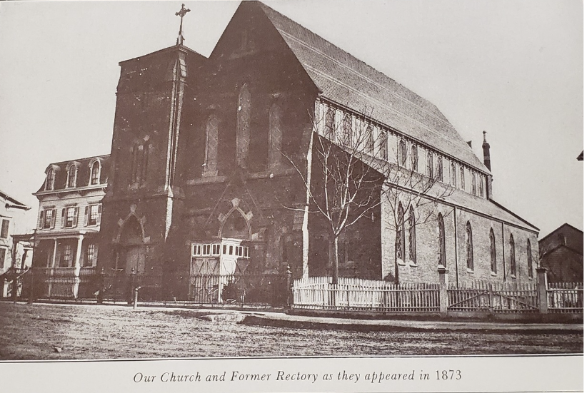 Holy Cross Church and former rectory as they appeared in 1873