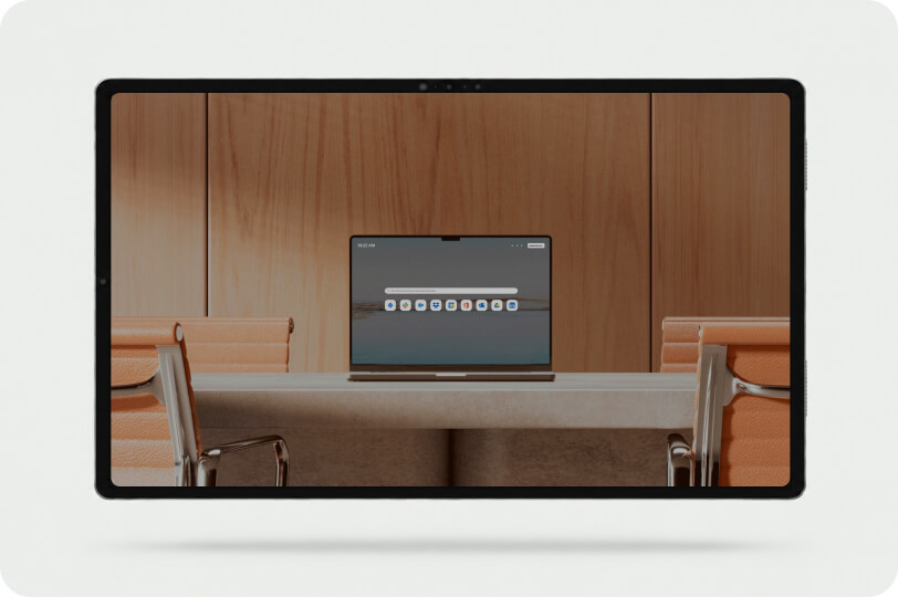 Island Enterprise Browser open on a laptop on a conference table in a meeting room