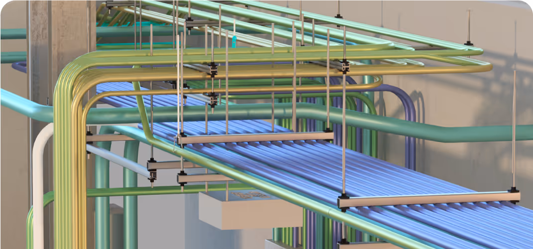 A group of colorful electrical pipes and conduits is suspended by metal rods from a ceiling in an industrial building or facility. The image represents Electrical BIM & VDC services