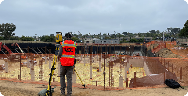 VEC onsite quality control using a tablet mounted on a tripod for 3D laser scanning and construction validation.