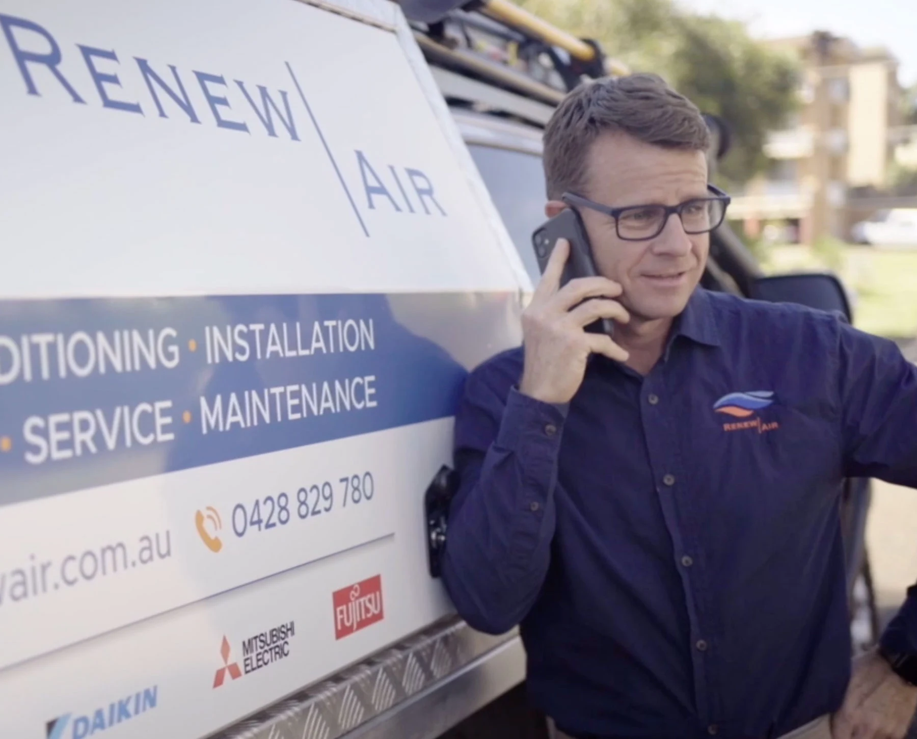 Renew Air technician on the phone to a customer in Bonny Hills NSW