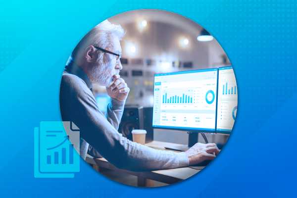 Man on computer looking at analytics