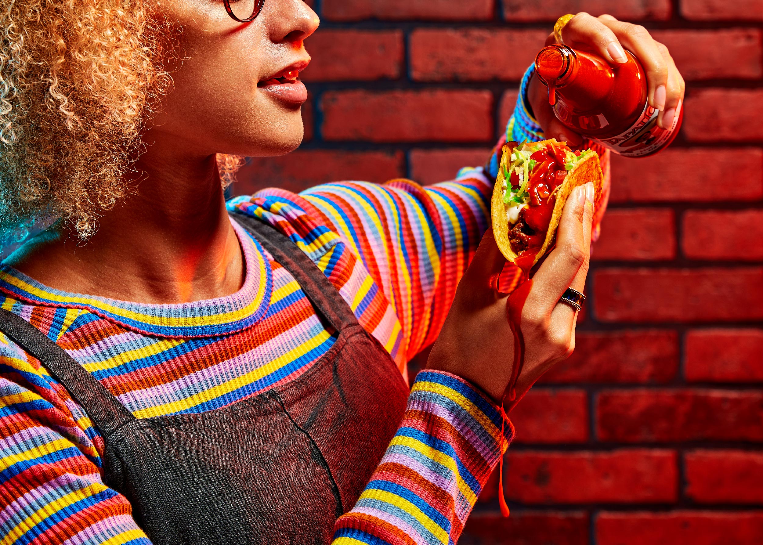 Tapatío hot sauce in taco