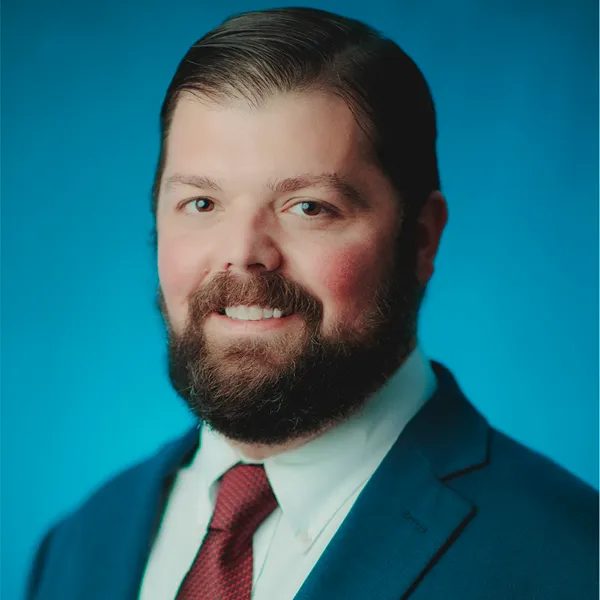 Photo of team member described below