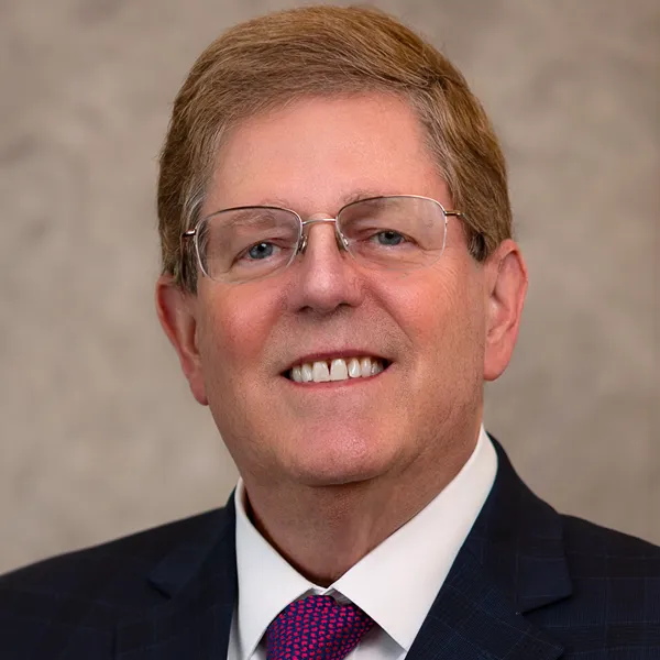 Photo of team member described below