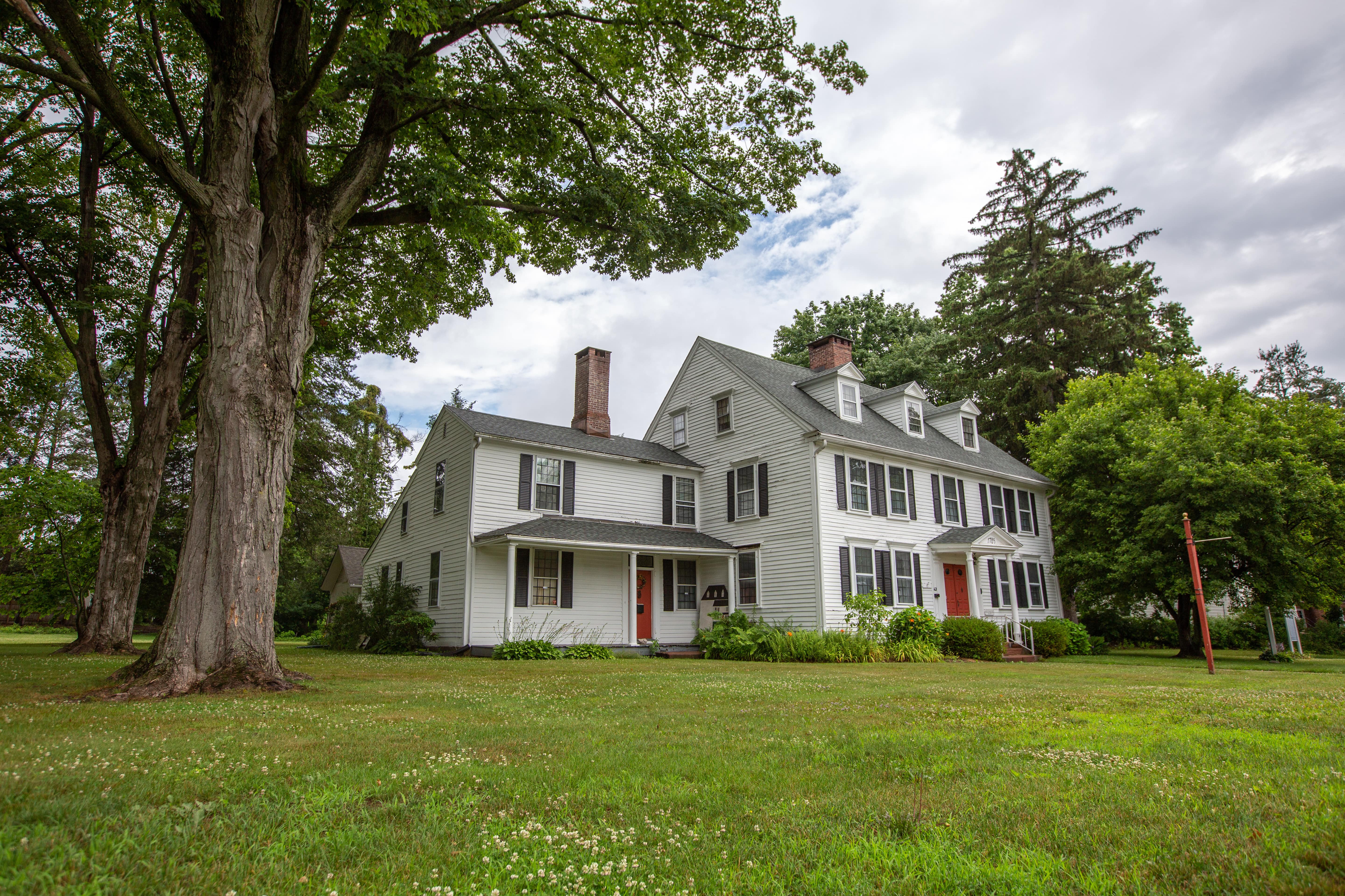 large white colonial-style house in Cheshire, CT