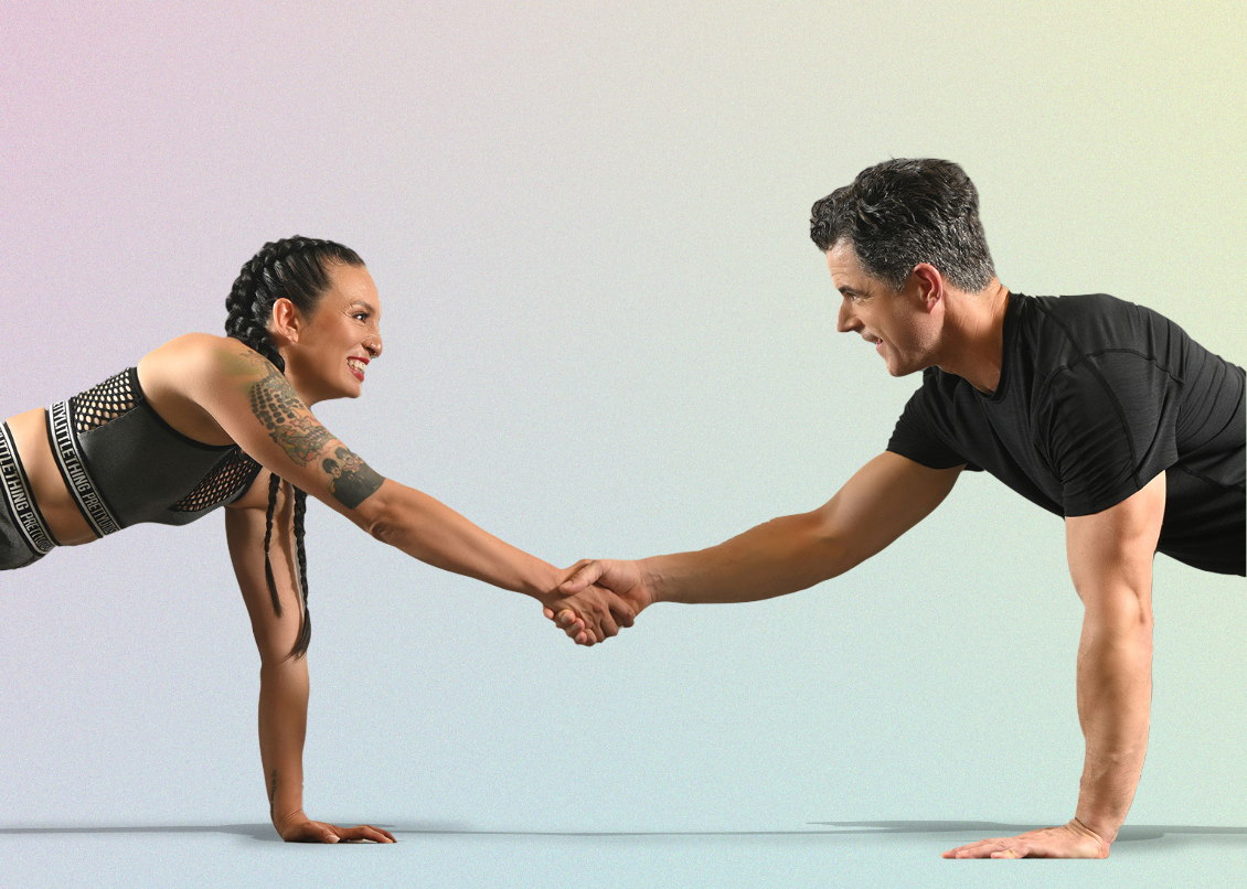 man and woman greeting each other while exercising
