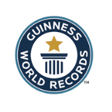 Guinness World Records logo with a gold star above a stylized column inside a blue circle.