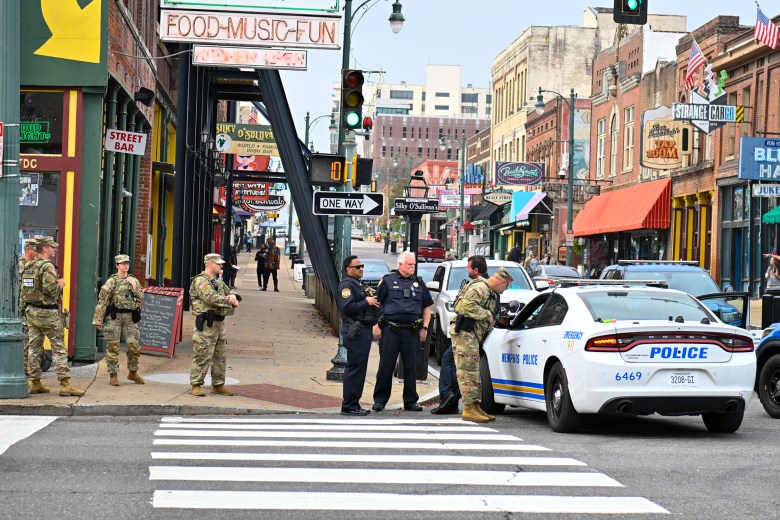 Tennessee National Guard troops and Memphis police officers on Beale Street