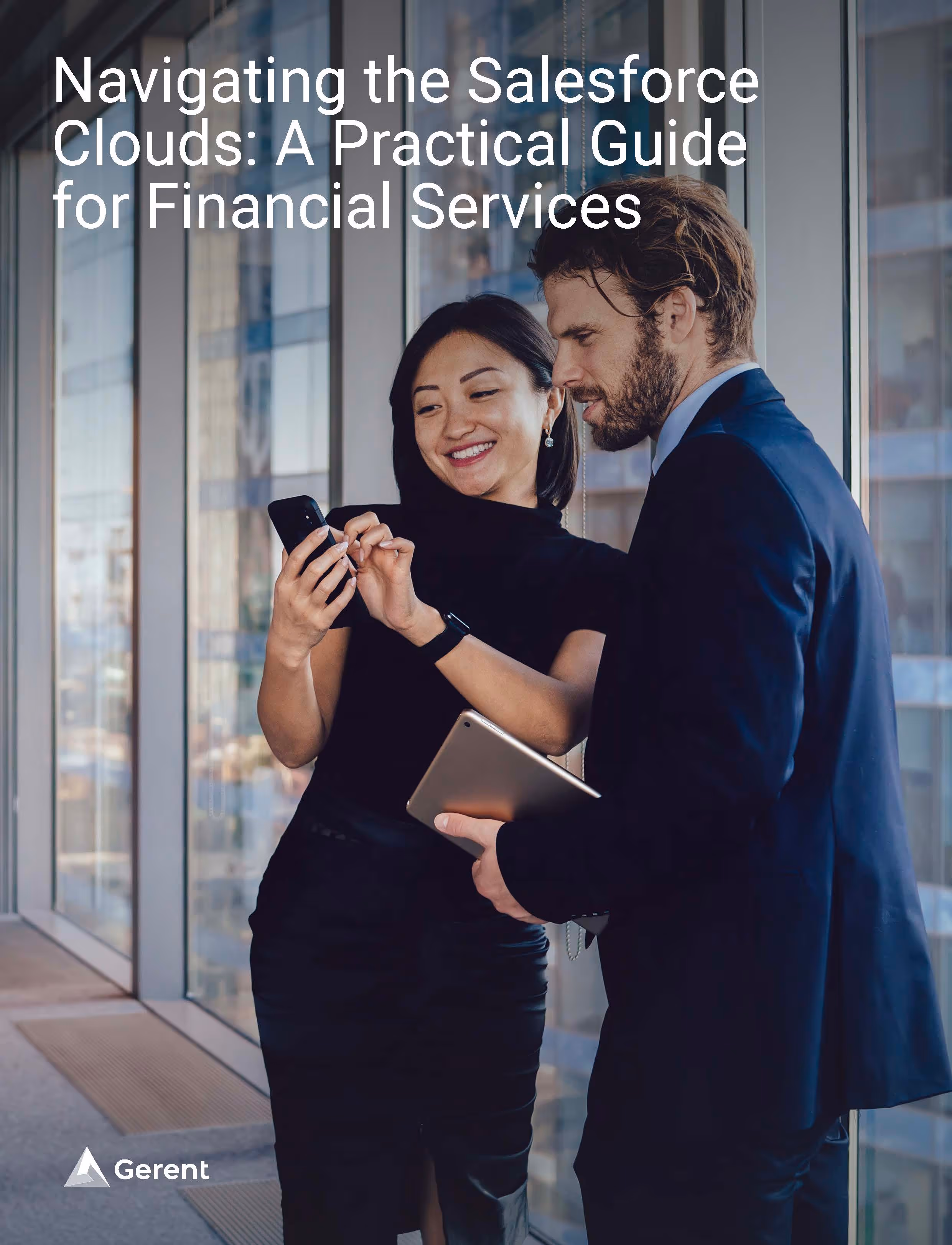 Business man and women standing next to one another looking at a cellphone the women is holding