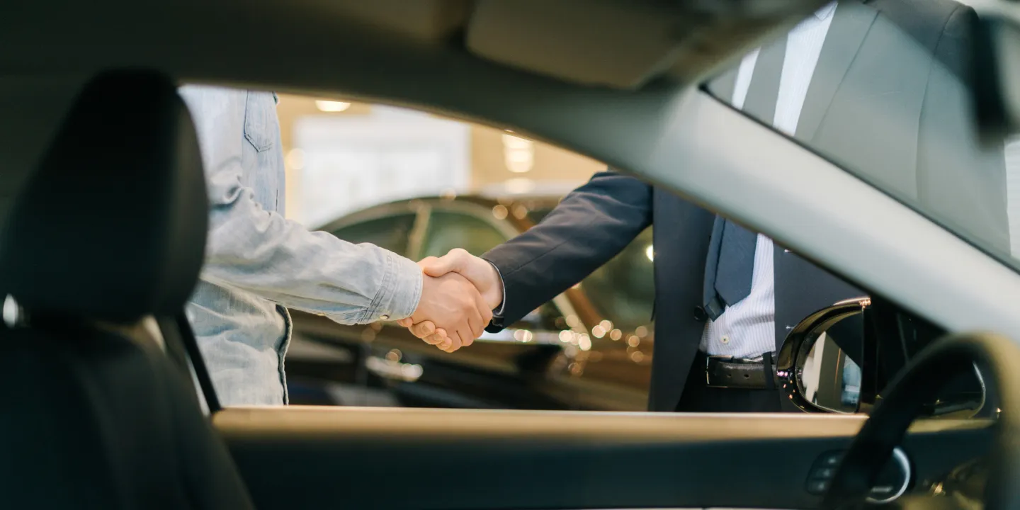 two men handshaking