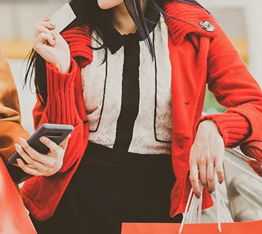 women with shopping bags