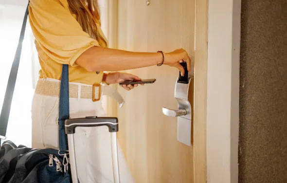 woman open a hotel room