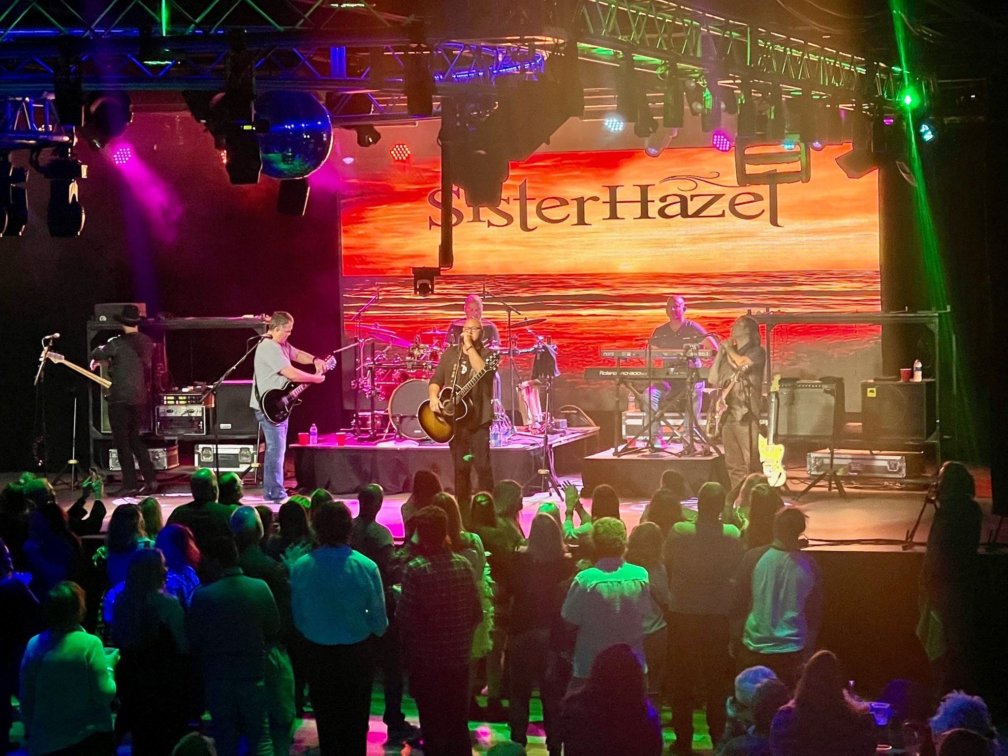 image of people watching band from event