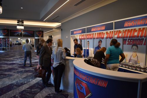 people checking-in at registration desk