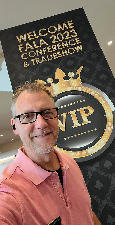 man standing in front of VIP tower