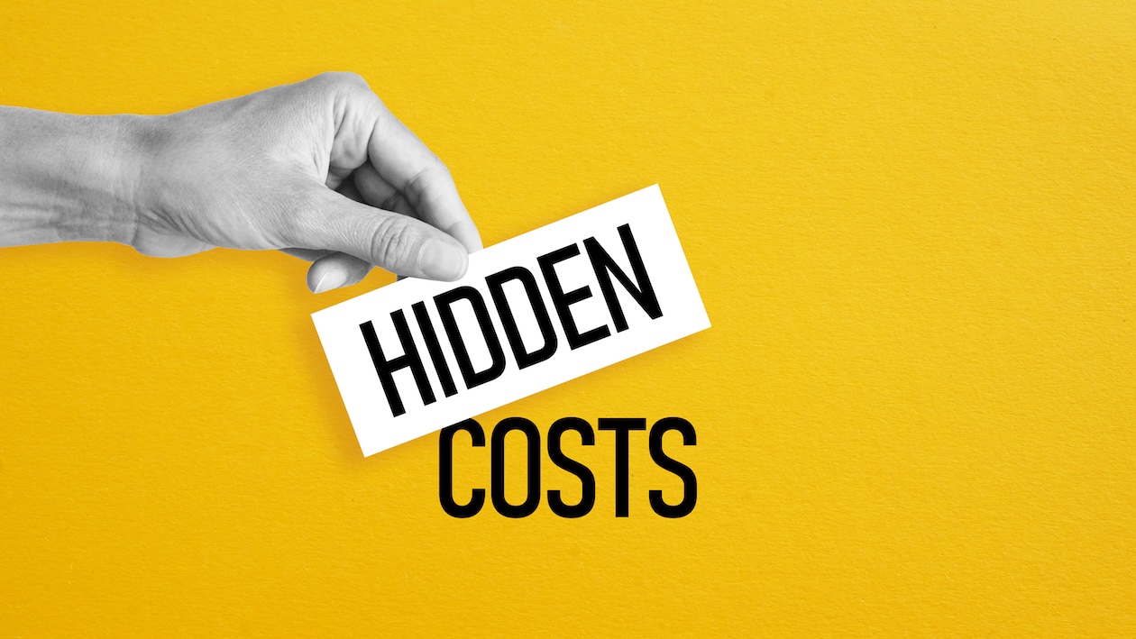 Hand holding a card labeled “Hidden” above the words “Costs” on a yellow background
