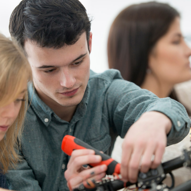 High school student in robotics class