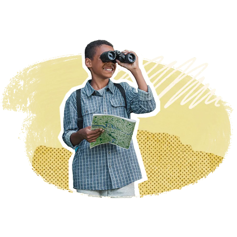 Purposeful boy looking through binoculars