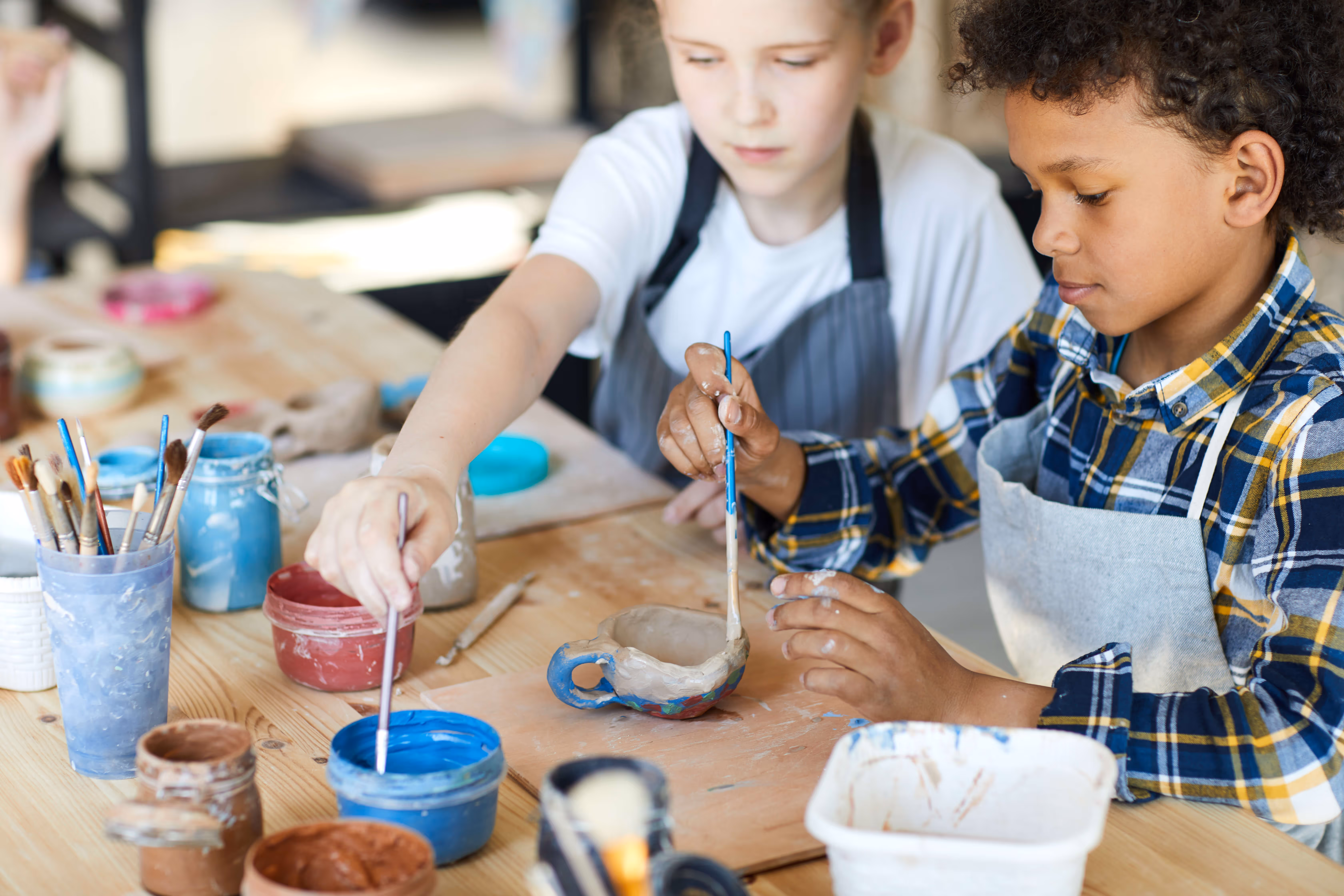 kids doing pottery