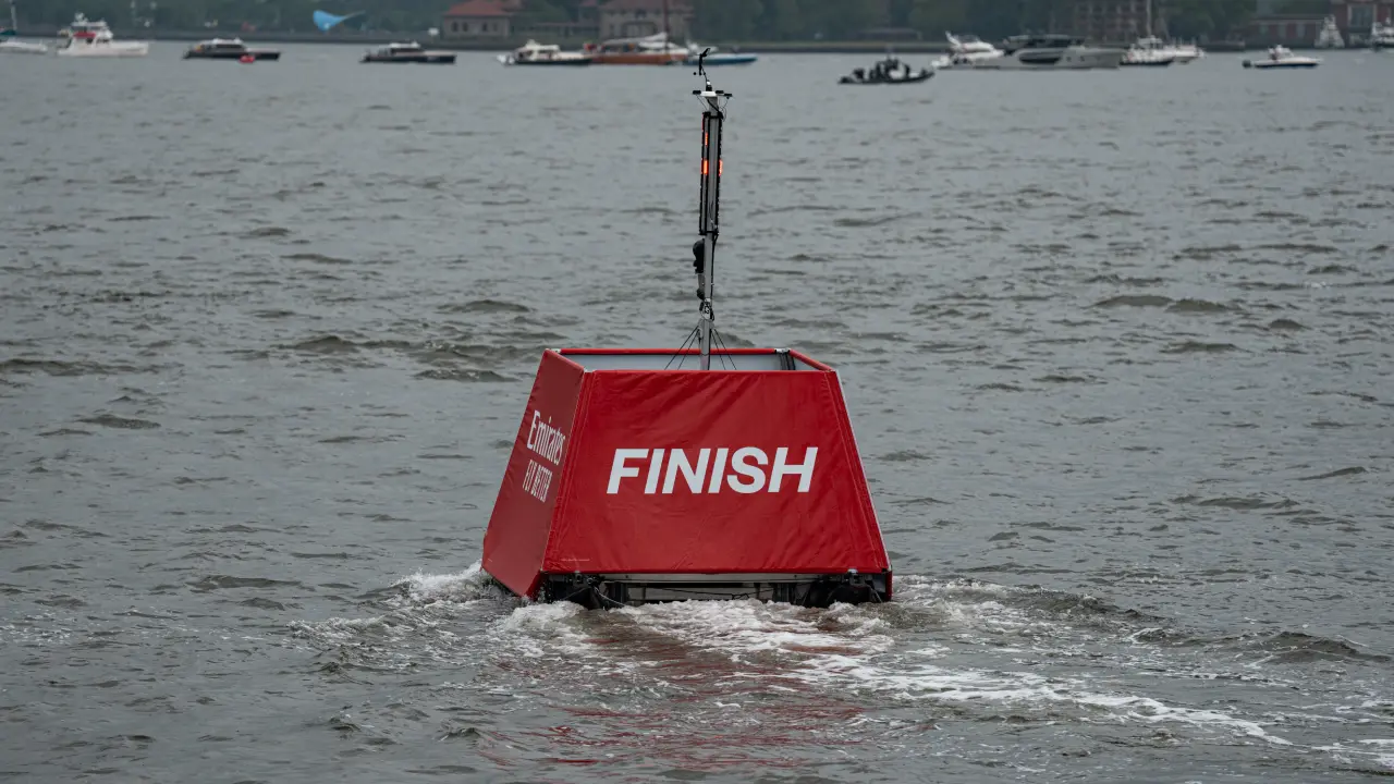 SailGP's remote-controlled mark driving out to its required position