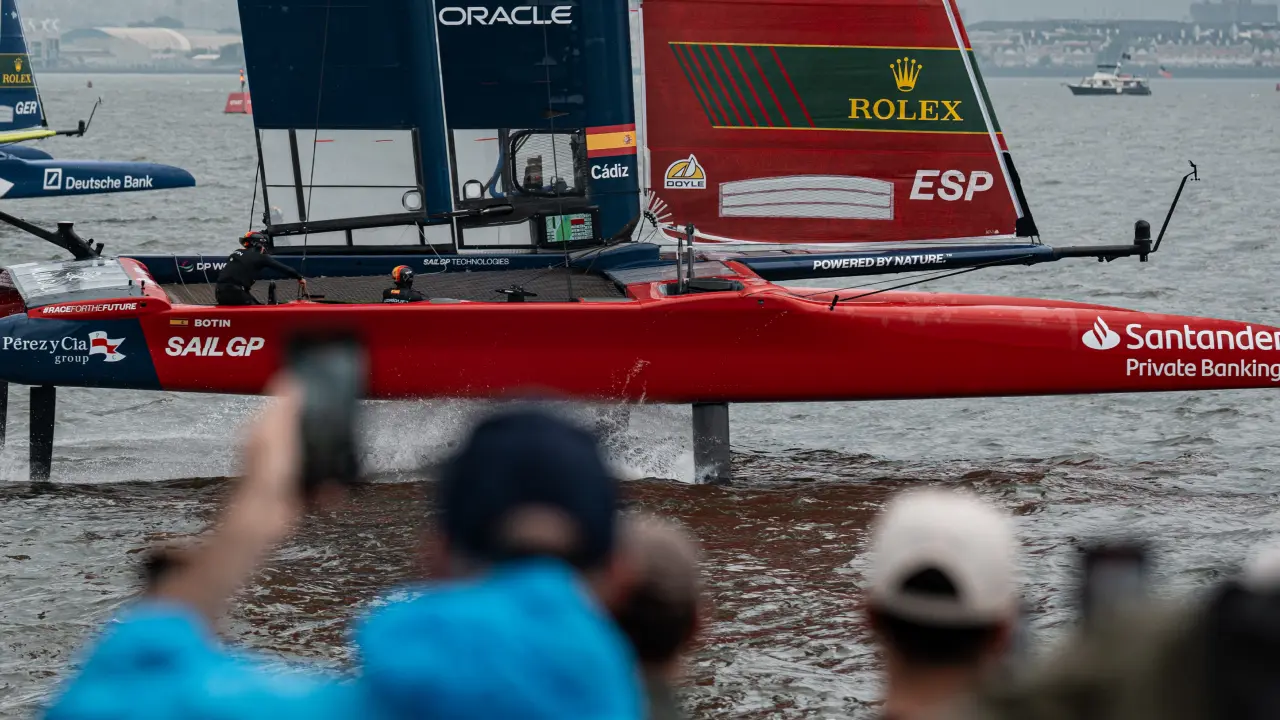 The Spain SailGP Team races close to shore